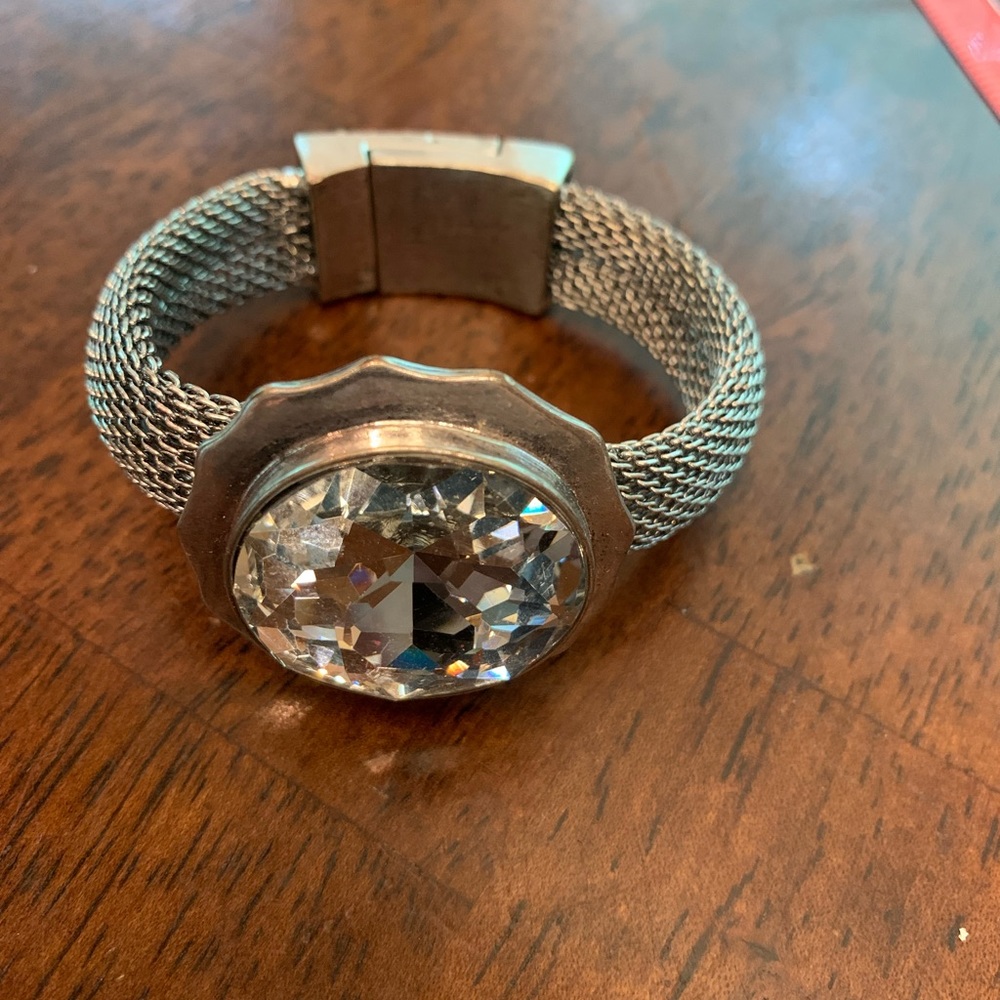 Silver tone mesh bracelet with stones